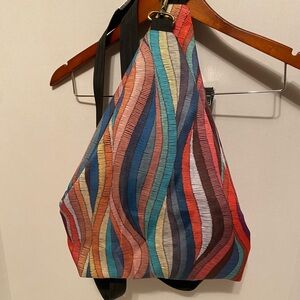 Bold Red and Orange Crossbody Bag with Sleek Design